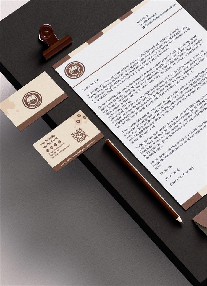 The Friendly Mocha Store stationery set: letterhead, business cards and pencil in a warm brown and cream palette